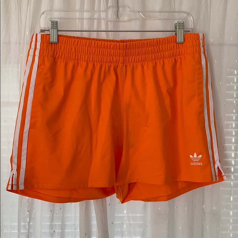 Adidas women’s 3 stripe shorts orange